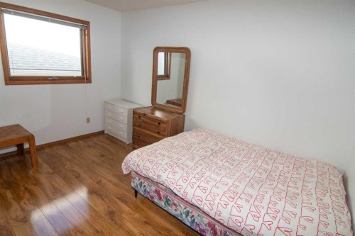 237 Sandarac Drive Nw, Calgary, AB - Indoor Photo Showing Bedroom
