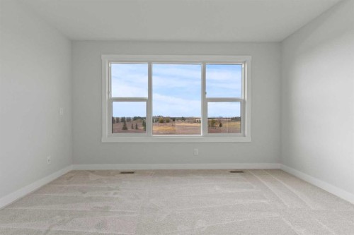302 Kinniburgh Loop, Chestermere, AB - Indoor Photo Showing Other Room