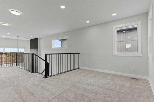 302 Kinniburgh Loop, Chestermere, AB - Indoor Photo Showing Other Room