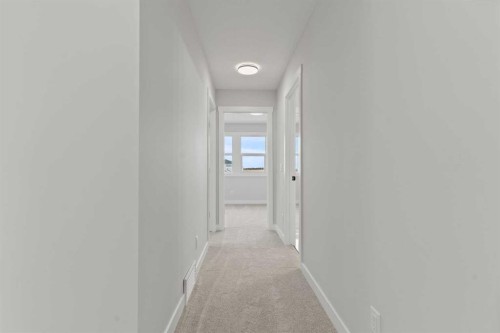 302 Kinniburgh Loop, Chestermere, AB - Indoor Photo Showing Other Room