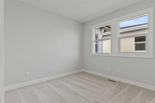 302 Kinniburgh Loop, Chestermere, AB - Indoor Photo Showing Other Room