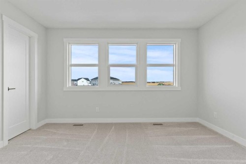 302 Kinniburgh Loop, Chestermere, AB - Indoor Photo Showing Other Room