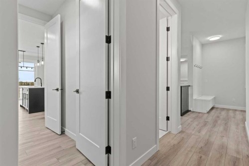 302 Kinniburgh Loop, Chestermere, AB - Indoor Photo Showing Other Room