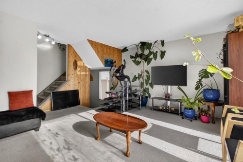 31 Templeby Way Ne, Calgary, AB - Indoor With Fireplace