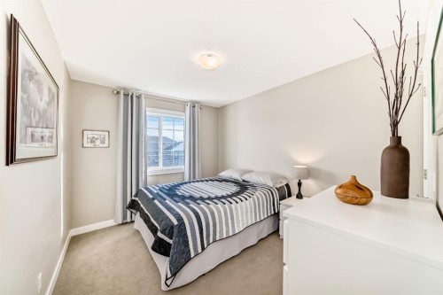 91 Baysprings Terrace, Airdrie, AB - Indoor Photo Showing Bedroom