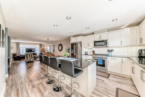 91 Baysprings Terrace, Airdrie, AB - Indoor Photo Showing Kitchen With Upgraded Kitchen