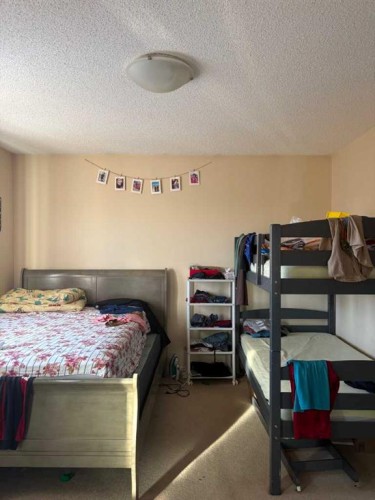 35 Saddlebrook Link Ne, Calgary, AB - Indoor Photo Showing Bedroom