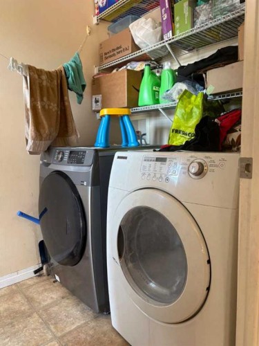 35 Saddlebrook Link Ne, Calgary, AB - Indoor Photo Showing Laundry Room
