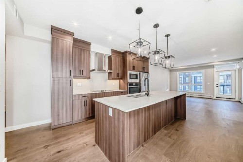 7121-1802 Mahogany Boulevard Se, Calgary, AB - Indoor Photo Showing Kitchen With Upgraded Kitchen