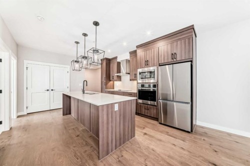 7121-1802 Mahogany Boulevard Se, Calgary, AB - Indoor Photo Showing Kitchen With Stainless Steel Kitchen