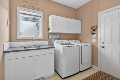 4754 Hamptons Way Nw, Calgary, AB - Indoor Photo Showing Laundry Room