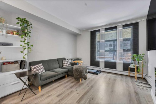 102-515 4 Avenue Ne, Calgary, AB - Indoor Photo Showing Living Room