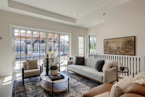 15 Normandy Lane Sw, Calgary, AB - Indoor Photo Showing Living Room