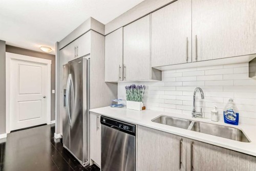 6204-302 Skyview Ranch Drive Ne, Calgary, AB - Indoor Photo Showing Kitchen With Stainless Steel Kitchen With Double Sink With Upgraded Kitchen