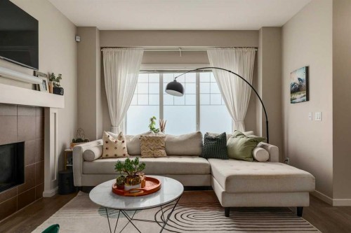 159 Mahogany Grove Se, Calgary, AB - Indoor Photo Showing Living Room With Fireplace