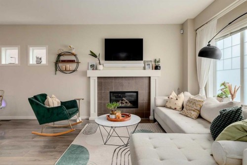 159 Mahogany Grove Se, Calgary, AB - Indoor Photo Showing Living Room With Fireplace