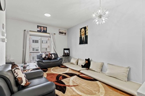 908-95 Skyview Close Ne, Calgary, AB - Indoor Photo Showing Living Room