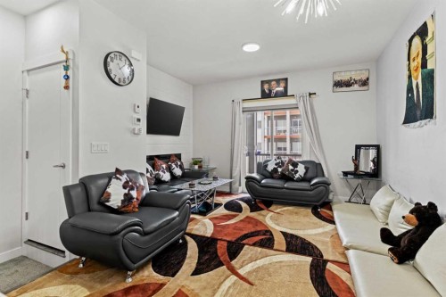 908-95 Skyview Close Ne, Calgary, AB - Indoor Photo Showing Living Room