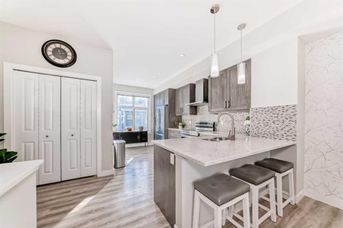 4143 Seton Drive Se, Calgary, AB - Indoor Photo Showing Kitchen With Upgraded Kitchen