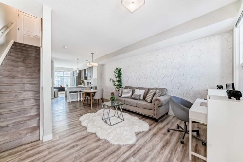 4143 Seton Drive Se, Calgary, AB - Indoor Photo Showing Living Room