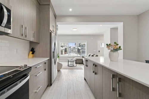 556 Chelsea Gardens, Chestermere, AB - Indoor Photo Showing Kitchen With Upgraded Kitchen