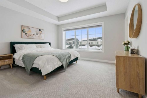 556 Chelsea Gardens, Chestermere, AB - Indoor Photo Showing Bedroom