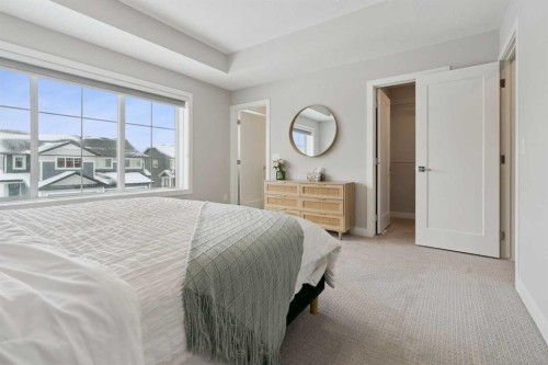 556 Chelsea Gardens, Chestermere, AB - Indoor Photo Showing Bedroom