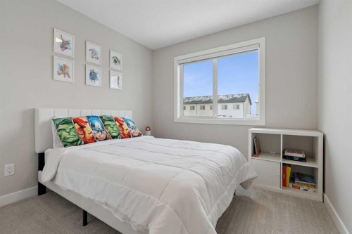556 Chelsea Gardens, Chestermere, AB - Indoor Photo Showing Bedroom