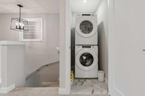 556 Chelsea Gardens, Chestermere, AB - Indoor Photo Showing Laundry Room