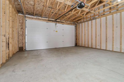 556 Chelsea Gardens, Chestermere, AB - Indoor Photo Showing Garage