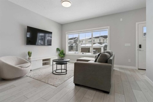 556 Chelsea Gardens, Chestermere, AB - Indoor Photo Showing Living Room