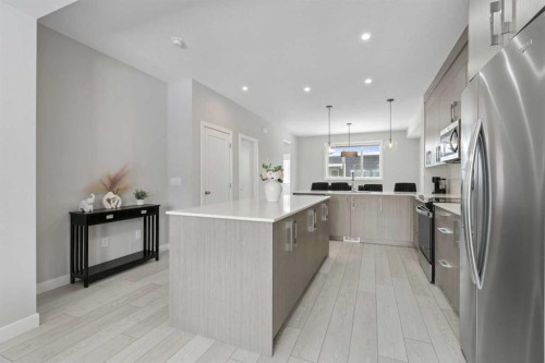 556 Chelsea Gardens, Chestermere, AB - Indoor Photo Showing Kitchen With Upgraded Kitchen