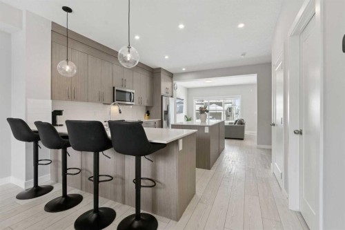 556 Chelsea Gardens, Chestermere, AB - Indoor Photo Showing Kitchen With Upgraded Kitchen