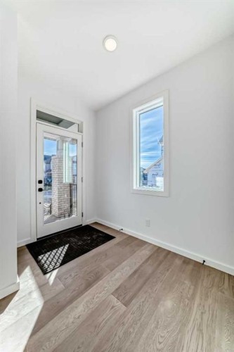 196 Starling Place Nw, Calgary, AB - Indoor Photo Showing Other Room