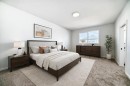 196 Starling Place Nw, Calgary, AB  - Indoor Photo Showing Bedroom 