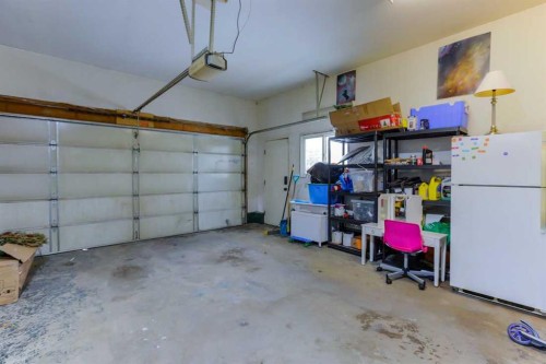 1118 Maple Avenue, Crossfield, AB - Indoor Photo Showing Garage
