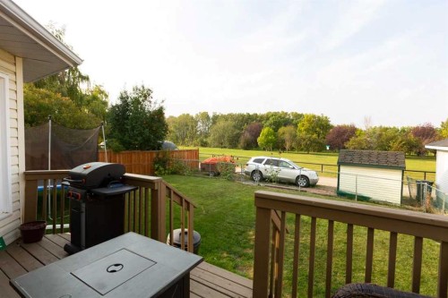 1118 Maple Avenue, Crossfield, AB - Outdoor With Deck Patio Veranda With Exterior