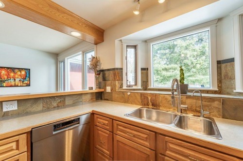 5227 Carney Road Nw, Calgary, AB - Indoor Photo Showing Kitchen With Double Sink