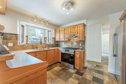 5227 Carney Road Nw, Calgary, AB - Indoor Photo Showing Kitchen With Double Sink