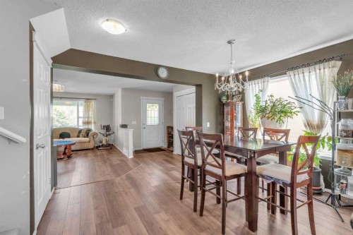 115 Evermeadow Avenue Sw, Calgary, AB - Indoor Photo Showing Dining Room