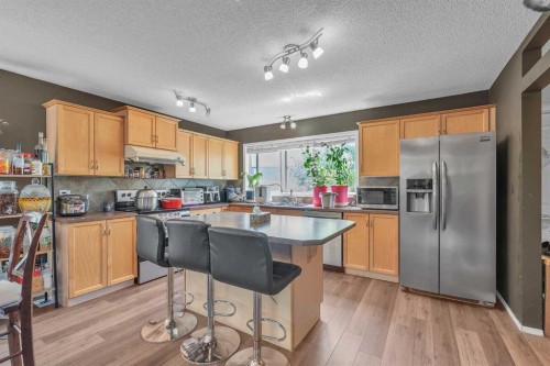 115 Evermeadow Avenue Sw, Calgary, AB - Indoor Photo Showing Kitchen