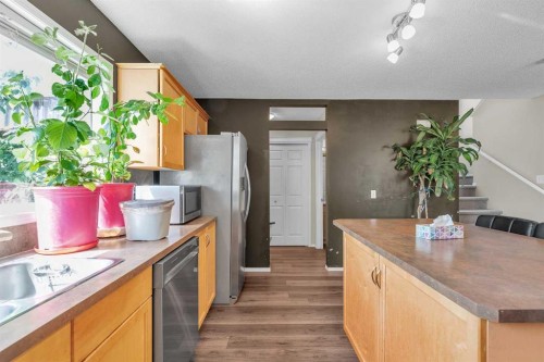 115 Evermeadow Avenue Sw, Calgary, AB - Indoor Photo Showing Kitchen