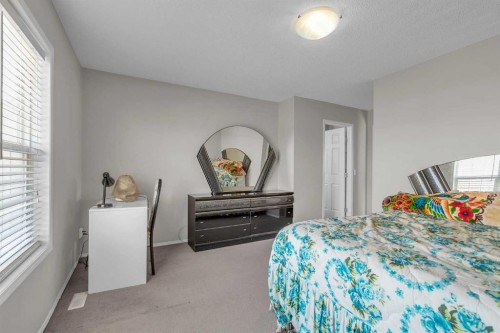115 Evermeadow Avenue Sw, Calgary, AB - Indoor Photo Showing Bedroom