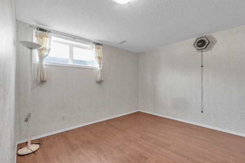 115 Evermeadow Avenue Sw, Calgary, AB - Indoor Photo Showing Other Room
