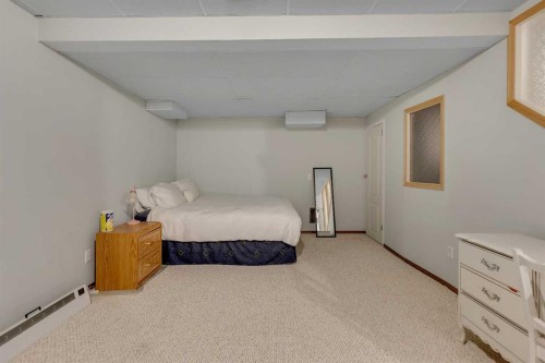 133 Riverview Park Se, Calgary, AB - Indoor Photo Showing Bedroom