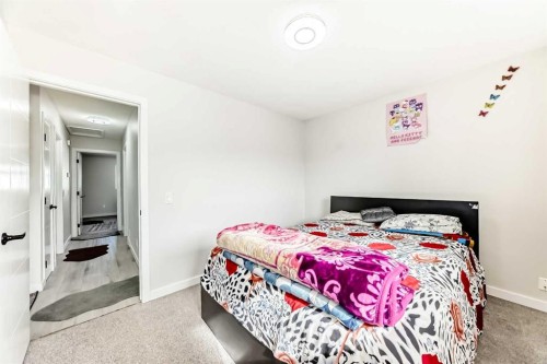 6712 23 Avenue Ne, Calgary, AB - Indoor Photo Showing Bedroom
