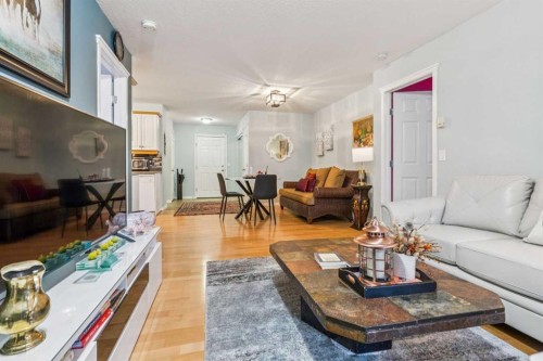105-15320 Bannister Road Se, Calgary, AB - Indoor Photo Showing Living Room