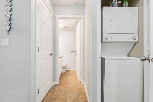 105-15320 Bannister Road Se, Calgary, AB - Indoor Photo Showing Laundry Room