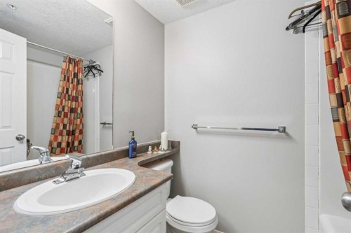 105-15320 Bannister Road Se, Calgary, AB - Indoor Photo Showing Bathroom
