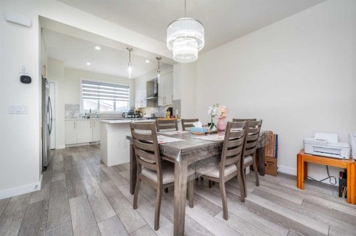 358 Chelsea Common, Chestermere, AB - Indoor Photo Showing Dining Room